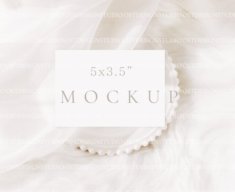 May include: White card mockup with the text "5x3.5" and "MOCKUP" on a white background. The card is sitting on a white beaded plate.