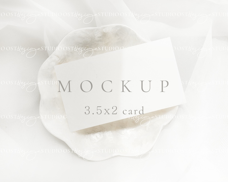 May include: A white card mockup on a white textured surface with the text "MOCKUP 3.5x2 card".