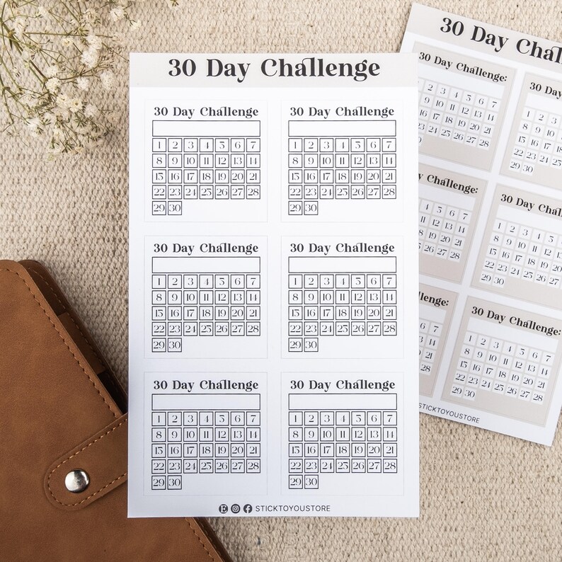 May include: Eight printable 30-day challenge calendar grids. Each grid is a 5x6 grid with numbers 1 through 30.