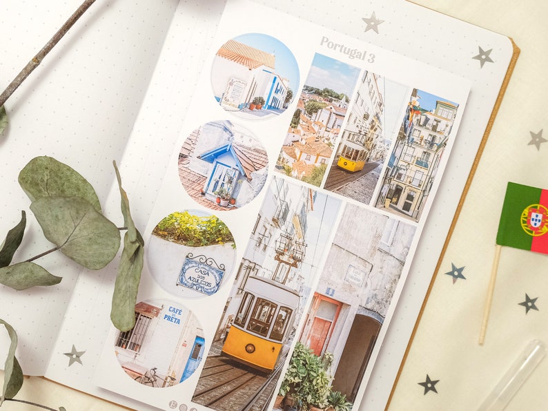 May include: A set of colorful travel stickers featuring images of buildings, a tram, and a cafe in Portugal. The stickers are round and rectangular and have a white background. The text "Portugal 3" is printed on the top of the stickers.