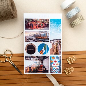 May include: A sheet of stickers featuring images of Dublin, Ireland. The stickers include a pub, a ship, a street scene, a Guinness sign, the Irish flag, and a street with colorful umbrellas.