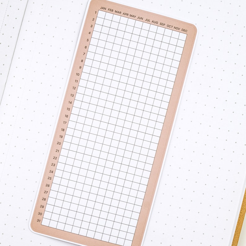 May include: A brown and white calendar grid with the months of the year listed across the top and the days of the month listed down the side.