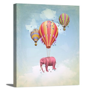 May include: A pink elephant is flying in the sky with three hot air balloons. The balloons are yellow, red, and green with pink, yellow, and blue stripes. The elephant is holding onto the bottom of the largest balloon.