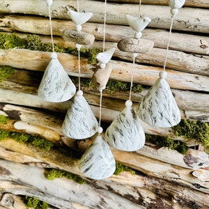 Handmade ceramic bells..Composition of 5 floral pressed bells with driftwood.Room and Garden Decor.Handmade.Wind Chimes.Fine craft. image 1