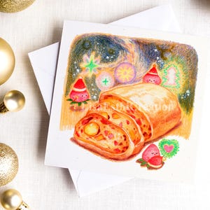 Puede incluir: Tarjeta de felicitación navideña con una colorida ilustración de un pastel de frutas en rodajas, decoraciones festivas y personajes de dibujos animados con gorros de Papá Noel. La tarjeta está sobre un sobre blanco, rodeada de adornos navideños dorados.