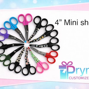May include: A collection of 4-inch mini shears in various colors and patterns, including pink, blue, purple, green, and black. Some shears have patterned handles. The text "4" Mini shears" is displayed.
