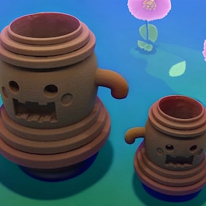 May include: Two brown, cartoon-like figures with open mouths and arms, resembling pots, sit on a blue and green surface with pink flowers. The figures have a stacked, tiered design and a friendly, whimsical appearance.