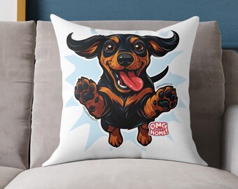 May include: White square throw pillow featuring a cartoon dachshund dog with a happy expression, outstretched paws, and a red tongue. The dog is black and brown with a light blue starburst background. The text "OMG HOME!" is in a red box.