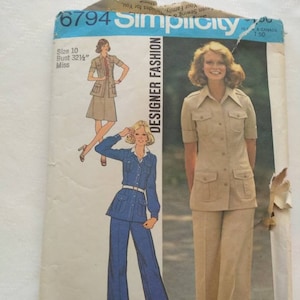 May include: A sewing pattern for a two-piece outfit. The pattern is for a shirt with a collar and long sleeves and pants with a wide leg. The pattern is from Simplicity, pattern number 6794. The pattern is for size 10, bust 32 1/2 inches.