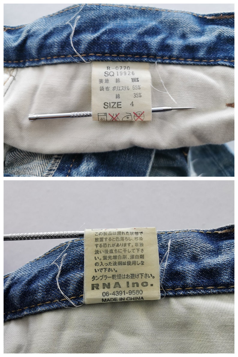 May include: Close-up of the inside of blue denim jeans. The jeans have a white interior with tags displaying size 4, fabric composition, and washing instructions. Additional tag includes "RNA Inc." and "MADE IN CHINA".