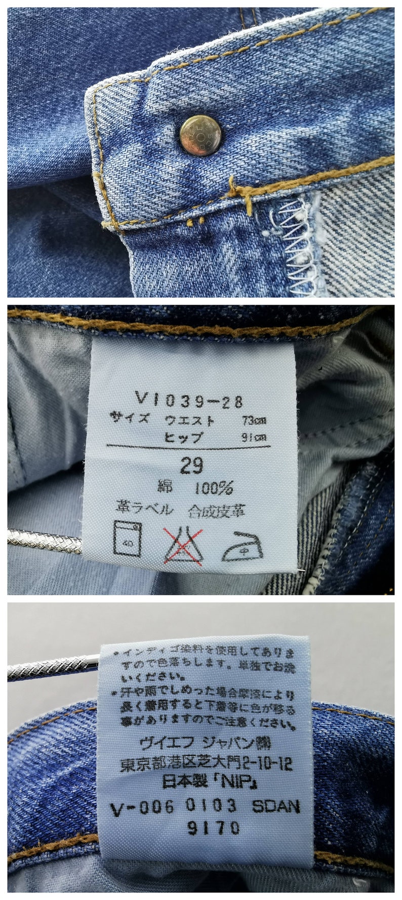 May include: Close-up of blue denim jeans with a button closure. The tag reads "V1039-28" with waist 73cm and hip 91cm. The jeans are size 29, made of 100% cotton. Additional text on the tag includes washing instructions and the manufacturer's information.