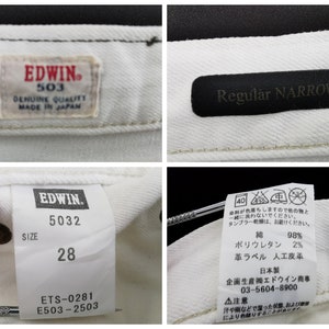 K&ouml;nnte beinhalten: Nahaufnahme einer wei&szlig;en Jeans mit mehreren Etiketten. Ein Etikett lautet "EDWIN 503 GENUINE QUALITY MADE IN JAPAN". Ein anderes Etikett besagt "Regular NARROW". Ein drittes Etikett zeigt die Gr&ouml;&szlig;e 28 an.