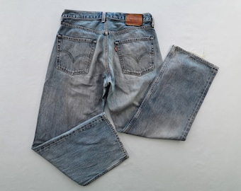 Pantalones vaqueros Levis 503 desgastados, talla 31. Pantalones vaqueros Levis 503 de mezclilla, talla 31/32x28.