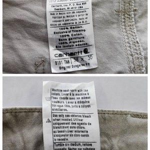 May include: Close-up of Carhartt B151 TAN Original Dungaree Fit pants label. The label indicates the pants are 100% cotton, size 38 x 30, and made in Mexico with USA components. Washing instructions are also included.