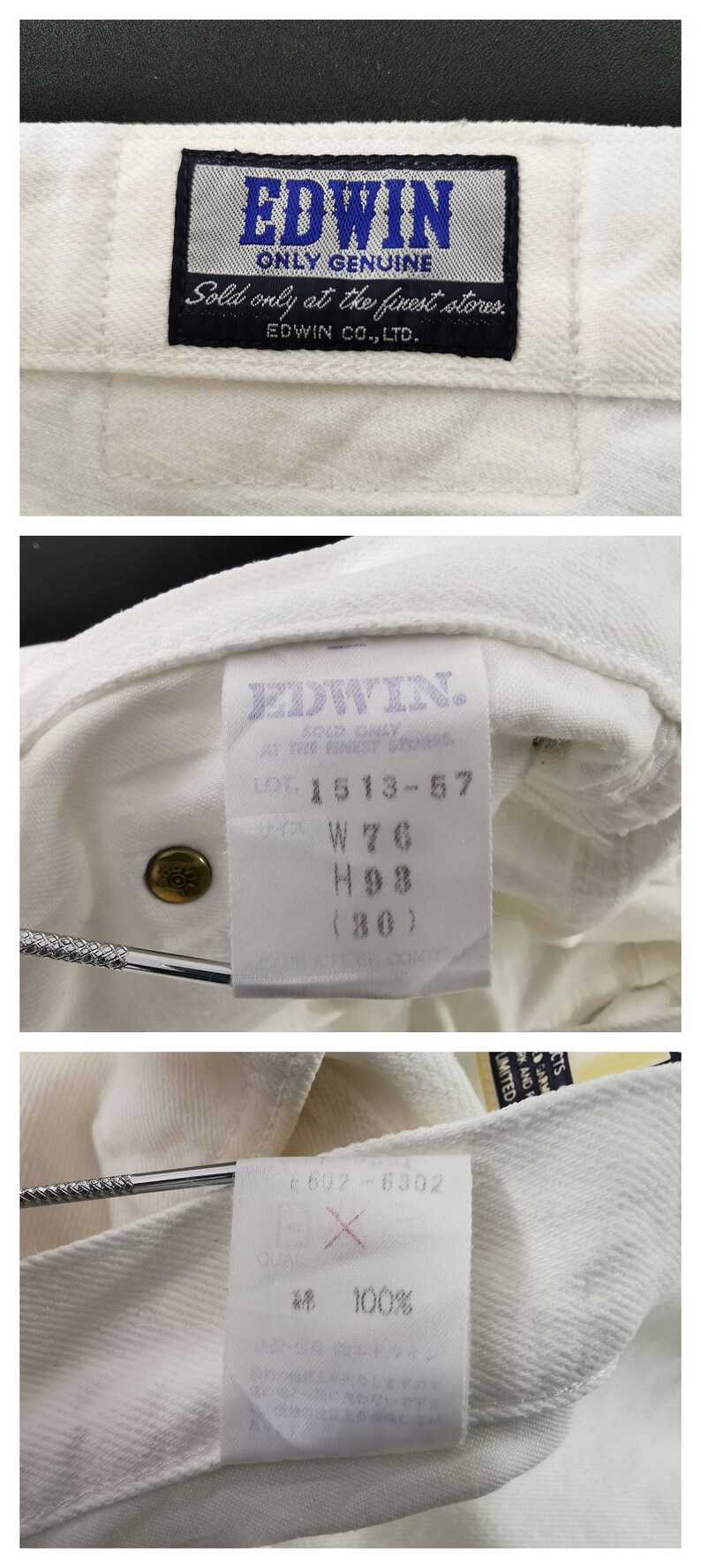 May include: Close-up of white denim fabric with multiple tags. The top tag reads "EDWIN ONLY GENUINE" in blue and black. Other tags show details like "LOT 1513-57" and "W76". The fabric is textured.