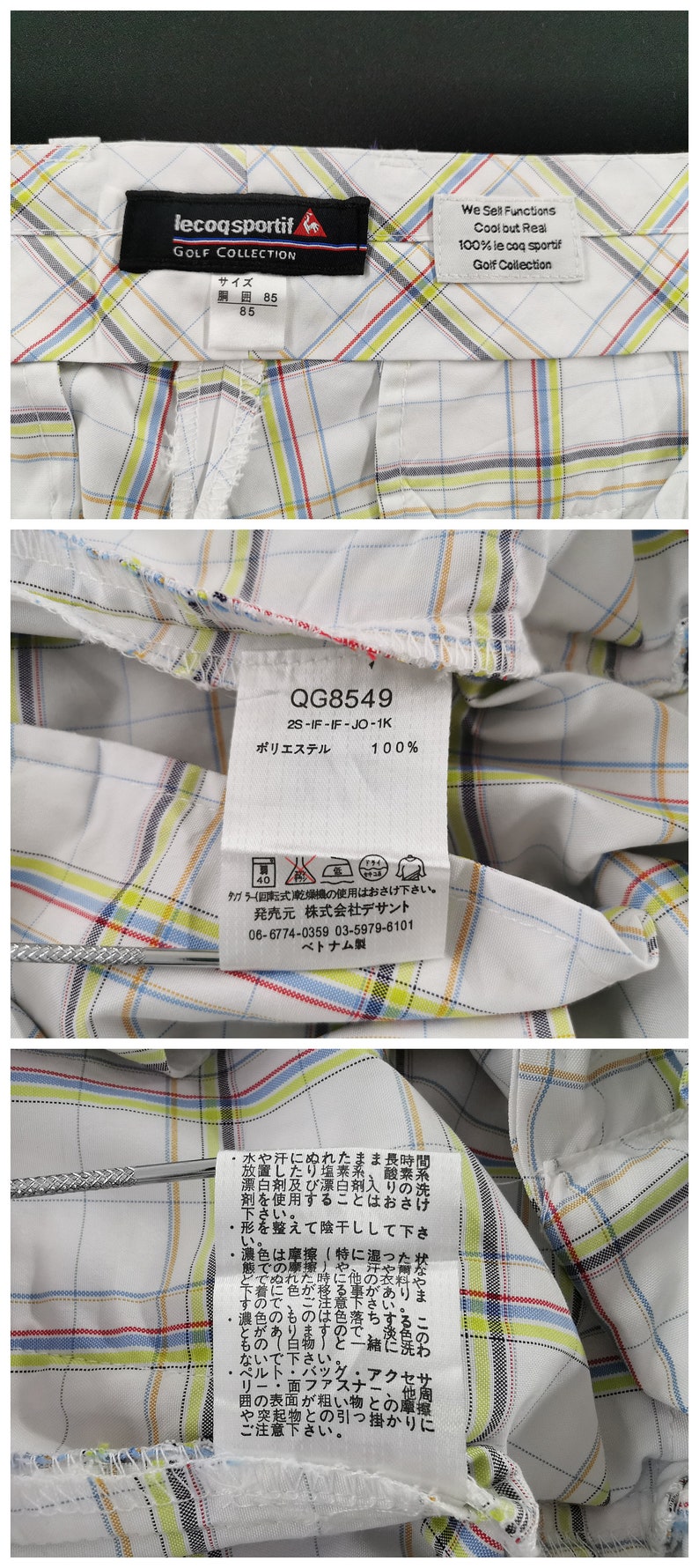 Op de afbeelding: Een wit golf shirt met een rood, blauw en geel ruitpatroon. Het shirt heeft een label met de tekst "lecoqsportif GOLF COLLECTION" en "QG8549 2S-IF-IF-JO-1K" in het Japans. Het label bevat ook wasinstructies en de tekst "100% ポリエステル" in het Japans.