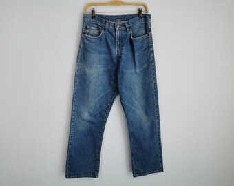 Pantalones vaqueros desgastados vintage de Polo Ralph Lauren, talla 32. Pantalones vaqueros de mezclilla de Polo Ralph Lauren, talla 32.