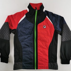 May include: A multi-colored jacket with a full zipper. The jacket features a red, navy blue, black, and gray color scheme. The jacket has a quilted pattern on the sleeves and a small logo on the chest.