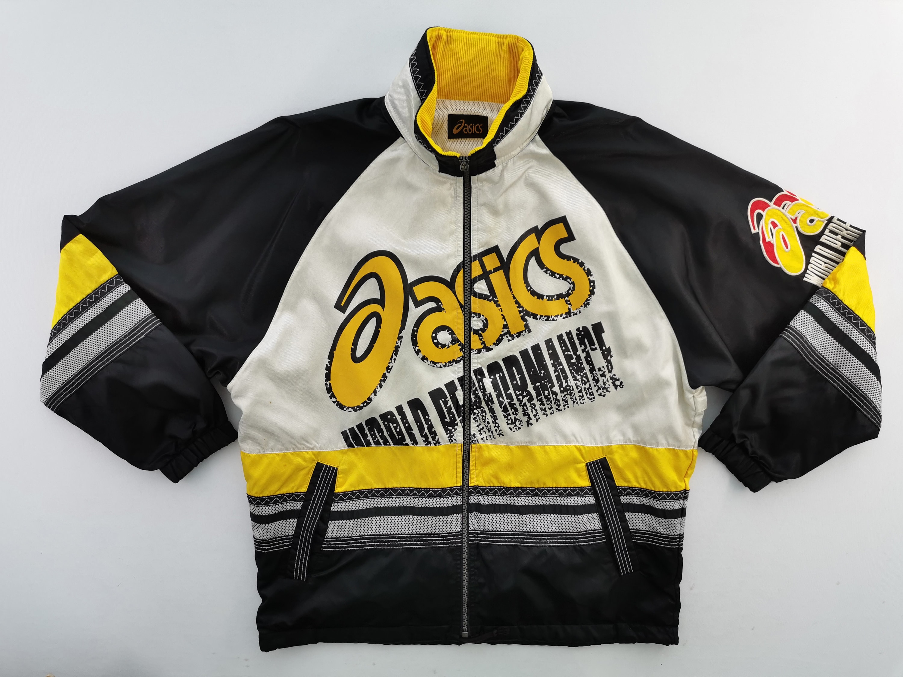 Asics best jacket sales