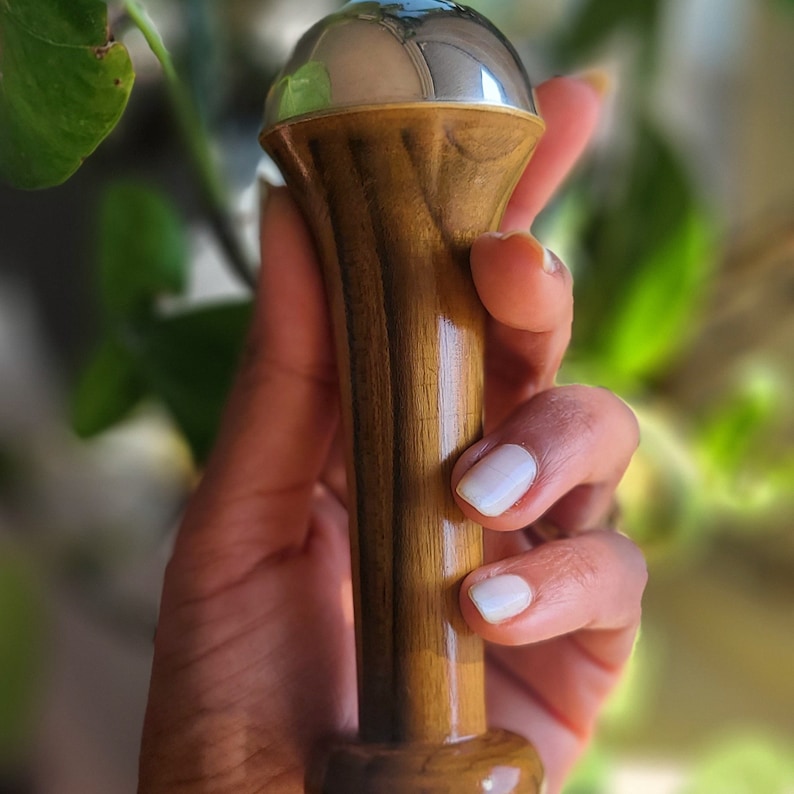 May include: A set of three ceramic mugs with a speckled, matte finish. The mugs are in shades of cream, light gray, and dark gray. Each mug has a simple, minimalist design, perfect for coffee or tea. The mugs are stacked on top of each other.