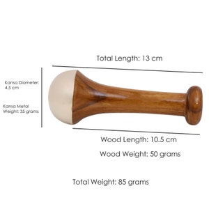 May include: A wooden massage tool with a light-colored, rounded end and a dark brown handle. The total length is 5.1 inches, with a 4.1-inch wood length. The total weight is 3 ounces.