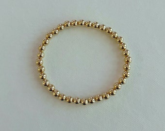 Bracelet extensible en perles remplies d'or 14 carats de 5 mm | Bracelet d'empilage élastique rempli d'or de boule ronde sans soudure, bijoux minimalistes délicats, cadeau