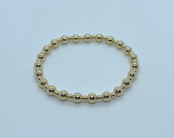 Pulsera elástica con cuentas rellenas de oro de 14 k / Pulsera elástica apilable rellena de oro / Joyería de oro minimalista / Regalo de oro minimalista hecho a mano