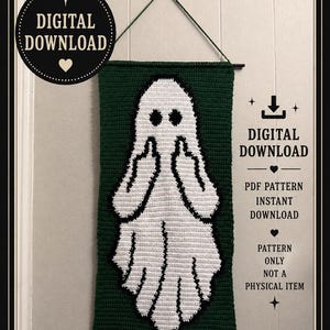 May include: A crochet wall hanging featuring a white ghost on a dark green background. The ghost is depicted with black eyes and both hands raised with middle fingers extended. Text reads: DIGITAL DOWNLOAD, PDF PATTERN INSTANT DOWNLOAD, PATTERN ONLY NOT A PHYSICAL ITEM, CROCHET PATTERN.
