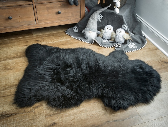 Black sheepskin throw hot sale