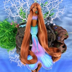 A warm auburn brown Japanese saran doll hair for rerooting standard 11.5 inch fashion dolls, monster high reroots, custom doll rehairing and restoring all doll and toy types. Ariel mermaid reroot not included.
