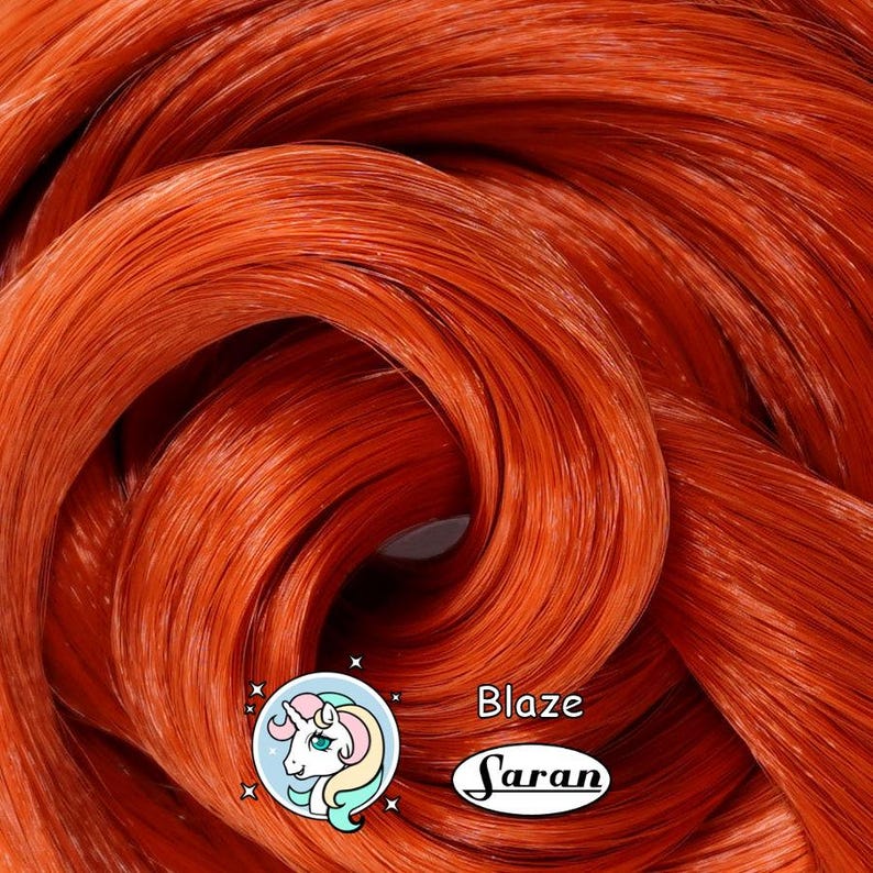A fiery red auburn Japanese saran doll hair for rerooting standard 11.5 inch fashion dolls, monster high reroots, custom doll rehairing and restoring all doll and toy types.