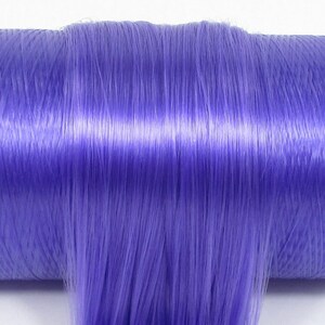 A pretty medium purple violet high quality nylon doll hair for rerooting dolls, monster high reroots, standard 11.5 inch fashion dolls, custom rehairing and restoring all doll and toy types.