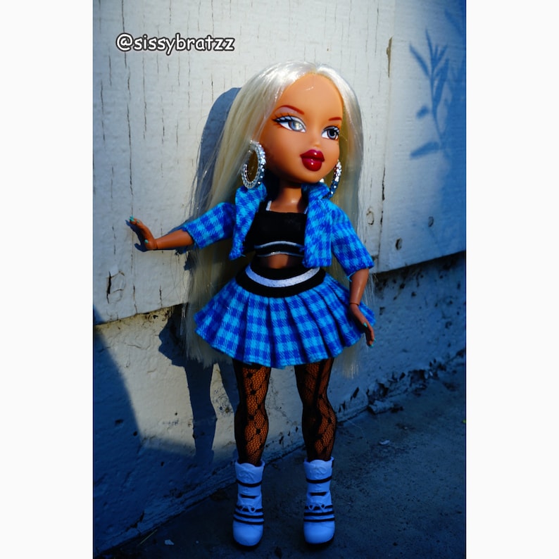 A pale blonde nylon doll hair for rerooting dolls, monster high reroots, standard 11.5 inch fashion dolls, custom rehairing and restoring all doll and toy types. Example Bratz reroot shown.  Doll not included.