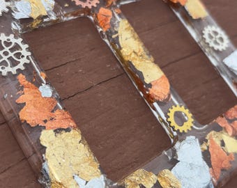 Gouden, roségouden en zilveren hars dubbele stopcontactafdekking