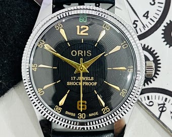 Vintage schwarzes Zifferblatt Handaufzugsuhr FHL Uhrwerk ST-96 Swiss Made Herrenarmbanduhr