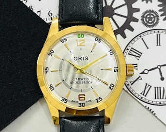 T*y様 ORIS 手巻き時計 1980年代ヴィンテージ時計 希少ヴィンテージ ORIS パープル文字盤 手巻き腕時計 メンズ FHF