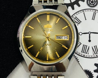 Vintage Orient Tri Star Automatik Braunes Zifferblatt 21Jewels Datum & Tag Armbanduhr / Japan Made Uhr