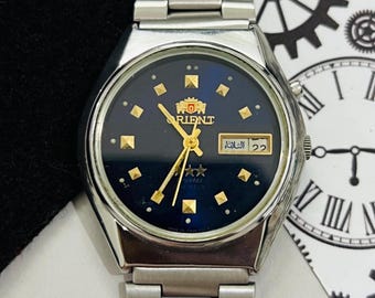 Vintage Orient Tri Star Automatik Blaues Zifferblatt 21Jewels Datum & Tag Armbanduhr / Japan Made Uhr