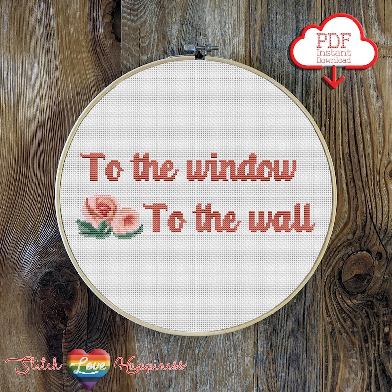 May include: A cross-stitch embroidery hoop with the text "To the window, To the wall" in coral-colored thread, along with a floral design. The design is set against a white fabric background, framed by a wooden hoop. A red cloud graphic with the text "PDF Instant Download" is in the upper right corner.