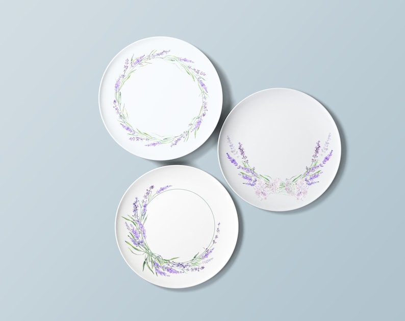 May include: Three white ceramic plates with lavender floral designs. The plates have a simple, elegant design with lavender flowers and leaves.