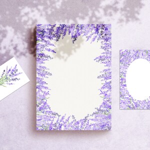 May include: Two blank cards with lavender flower borders. The larger card has a full border of lavender flowers, while the smaller card has a border with an oval cutout in the center.