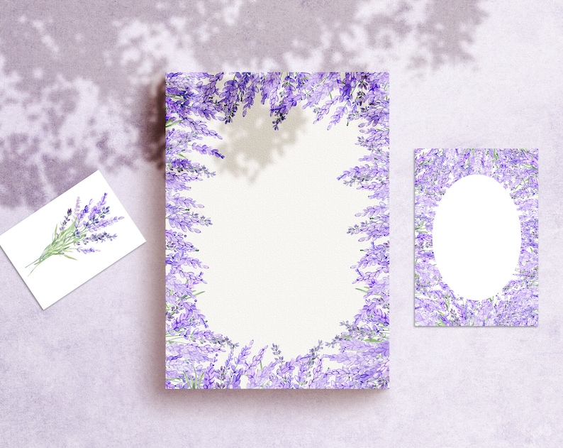 May include: Two blank cards with lavender flower borders. The larger card has a full border of lavender flowers, while the smaller card has a border with an oval cutout in the center.