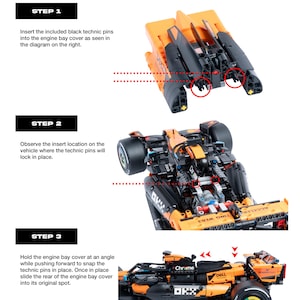 May include: Instructional guide for a McLaren MCL39 F1 car engine bay lockout, model TBMNT42228V. The document features three steps with diagrams showing the assembly of black technic pins into an orange and black vehicle component and chassis.