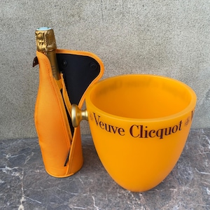 Cubitera o cubitera vintage de champán Veuve Clicquot Ponsardin de color naranja con estuche para botellas a juego, en muy buen estado.