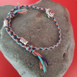 Tibetan Buddha/lucky charm bracelet