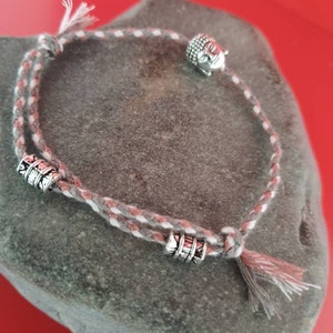 Tibetan Buddha/lucky charm bracelet