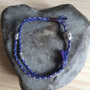 Tibetan Buddha/lucky charm bracelet