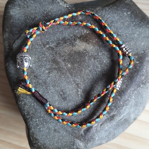 Tibetan Buddha/lucky charm bracelet
