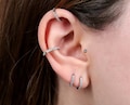 Tiny Gold Huggie Hoop Earrings, Sterling Silver CZ Huggie Hoop Earrings, Cartilage Huggie Hoop, Helix Huggie Hoop, Pave Huggie Hoop Earrings product logo