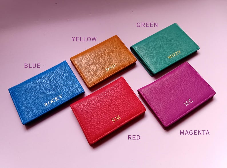 Slide showing the colors available with the wallets labled- blue, yellow, green, red and magenta.